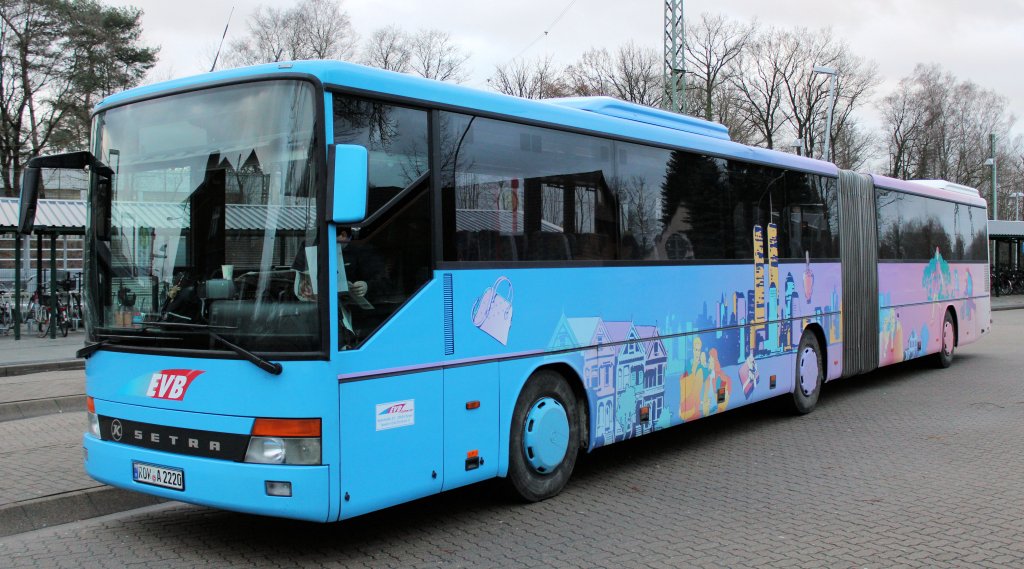 EVB Gelenkbus in ansprechender Lackierung / Beklebung. Tostedt, 05.01.2012