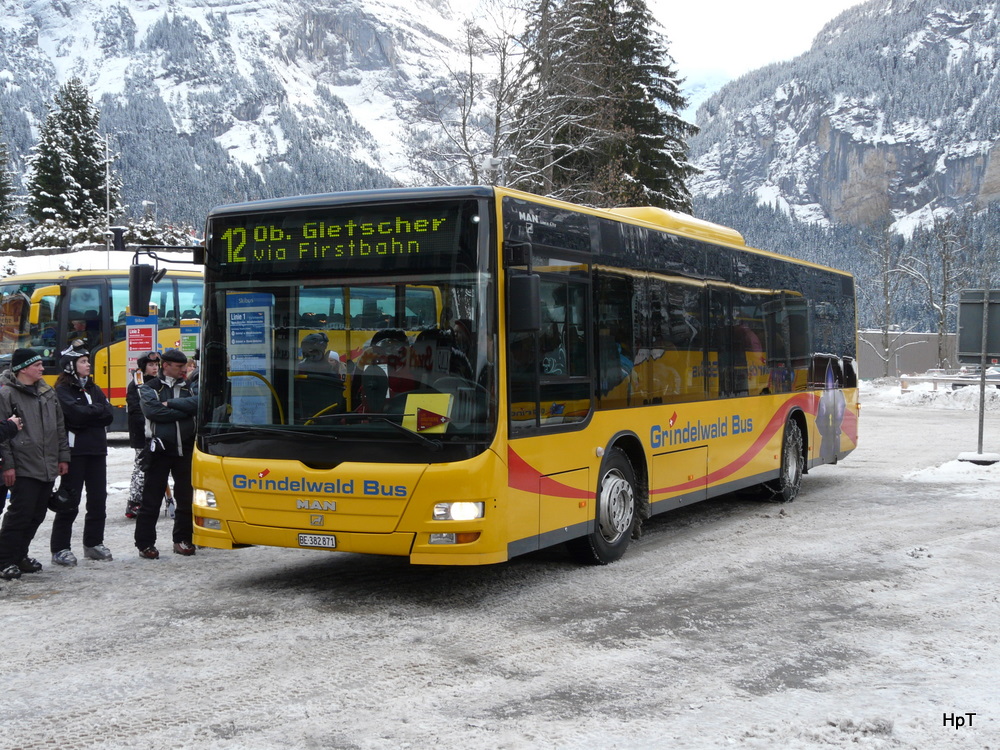 Grindelwald Bus - MAN Lion`s City BE 382871 bei den Bushaltestellen beim Bahnhof Grindelwald am 25.02.2011

