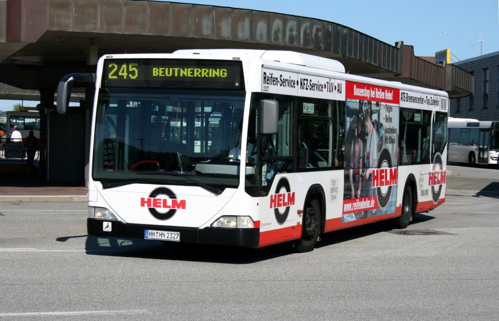 Hochbahn 2327 (HH HN 2327) mit Werbung fr Reifen Helm.
Hamburg Harburg ZOB, 17.6.2010.