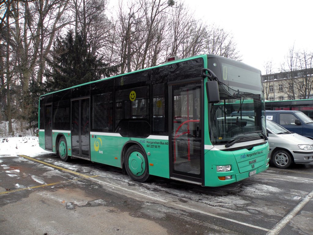 MAN Lion's City mit der Betriebsnummer 032 der Margrethen Bus AG auf einem Parkplatz in der Nhe des Zeughauses in Basel. Die Aufnahme stammt vom 13.02.2012.

