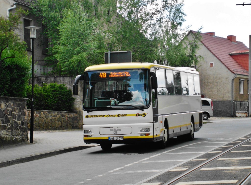 MAN L-Reihe auf der Linie 418 nach Rdersdorf Krankenhaus an der Haltestelle Woltersdorf Kirche.(22.6.2013) 