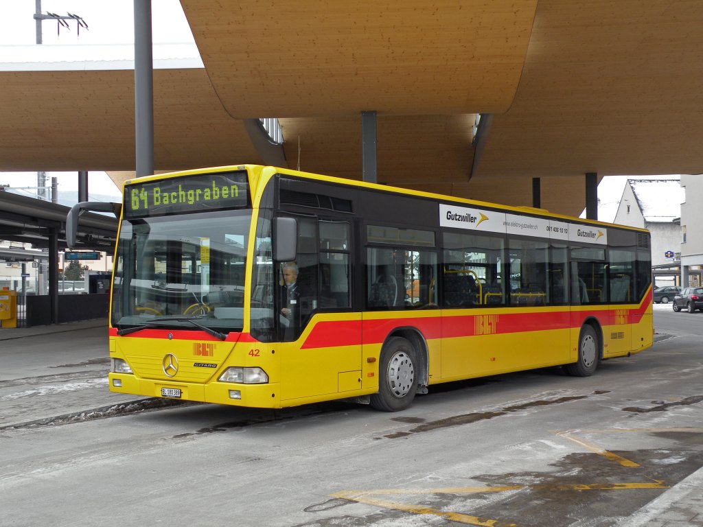 Mercedes Citaro mit der Betriebsnummer 42 auf der Linie 64 am Bahnhof in Dornach. Die Aufnahme stammt vom 13.02.2012.

