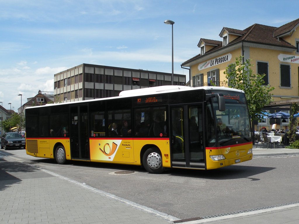Postauto auf der Linie 67 am Bahnhof Dornach. Die Aufnahme stammt vom 07.06.2011.
