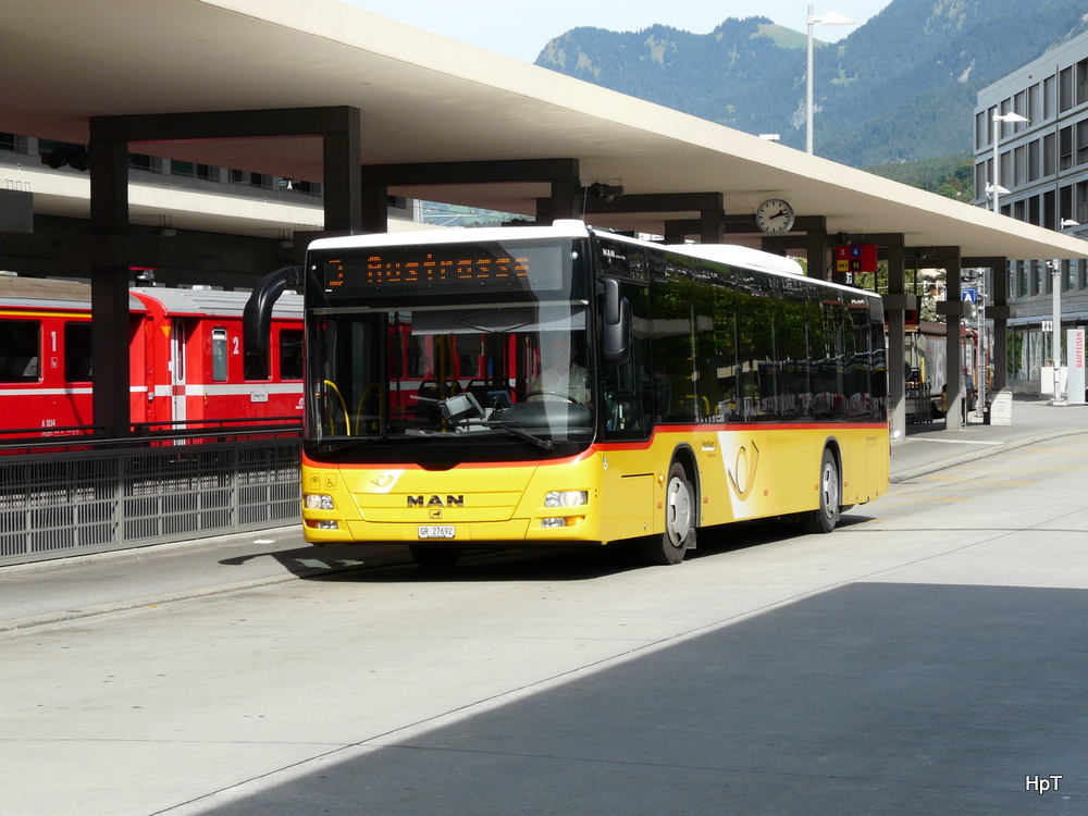 Postauto - MAN Lion`s City GR 27692 unterwegs vor dem Bahnhof in Chur am 18.09.2012