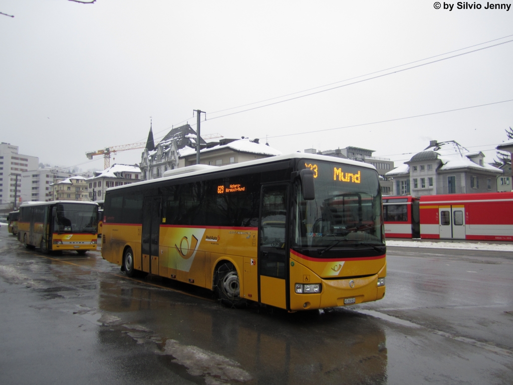 Postauto/Regie Brig VS 354 603 (Irisbus Crossway 10.8) am 15.12.2012 beim Bhf. Brig.
