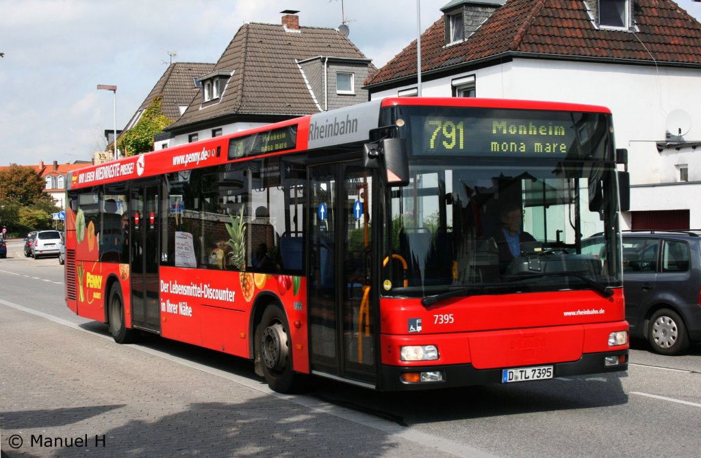 Rheinbahn 7395 (D TL 7395) mit Werbung fr den Penny Markt.
Aufgenommen am ZOB Monheim, 11.9.2010.