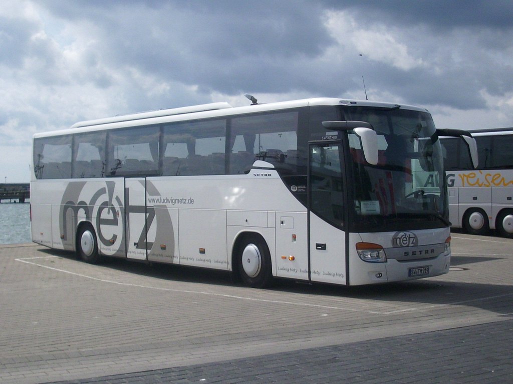 Setra 415-GT-HD von Metz aus Deutschland im Stadthafen Sassnitz am 13.07.2012