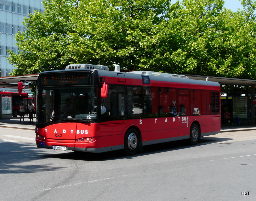 StadtBus Dornbirn - Solaris Urbino 10  Nr.12  BD 13372 bei den Bushaltestellen vor dem Bahnhof in Dornbirn am 24.05.2011