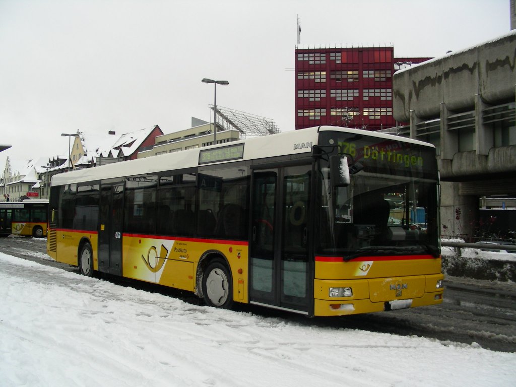 Staudacher, Mandach. MAN N313 (AG 6'449) in Brugg, Bahnhof. (20.12.2011)