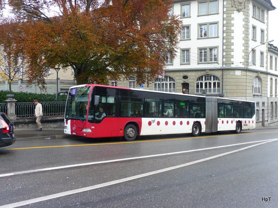 tpf - Mercedes Citaro Nr.586  FR 300427  unterwegs auf der Linie 6 in der Stadt Fribourg am 09.11.2009