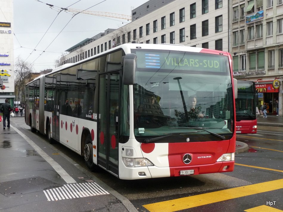 tpf - Mercedes Citaro Nr.597  FR 300399  unterwegs auf der Linie 5 bei den Bushaltestellen vor dem Bahnhof von Fribourg am 09.11.2009