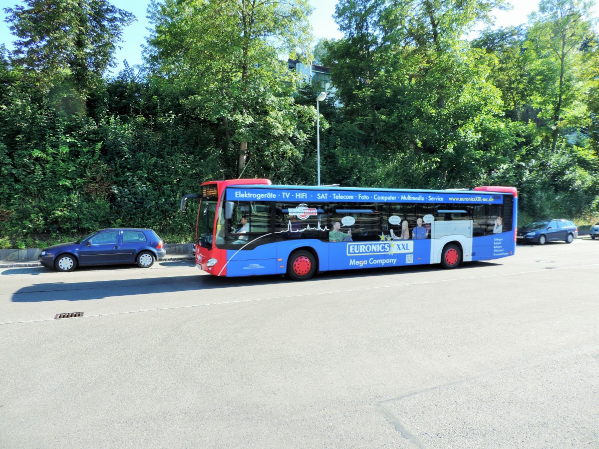 Citaro C2, Wagen 207, mit Vollwerbung vor dem Bahnhof am 17/07/2014.