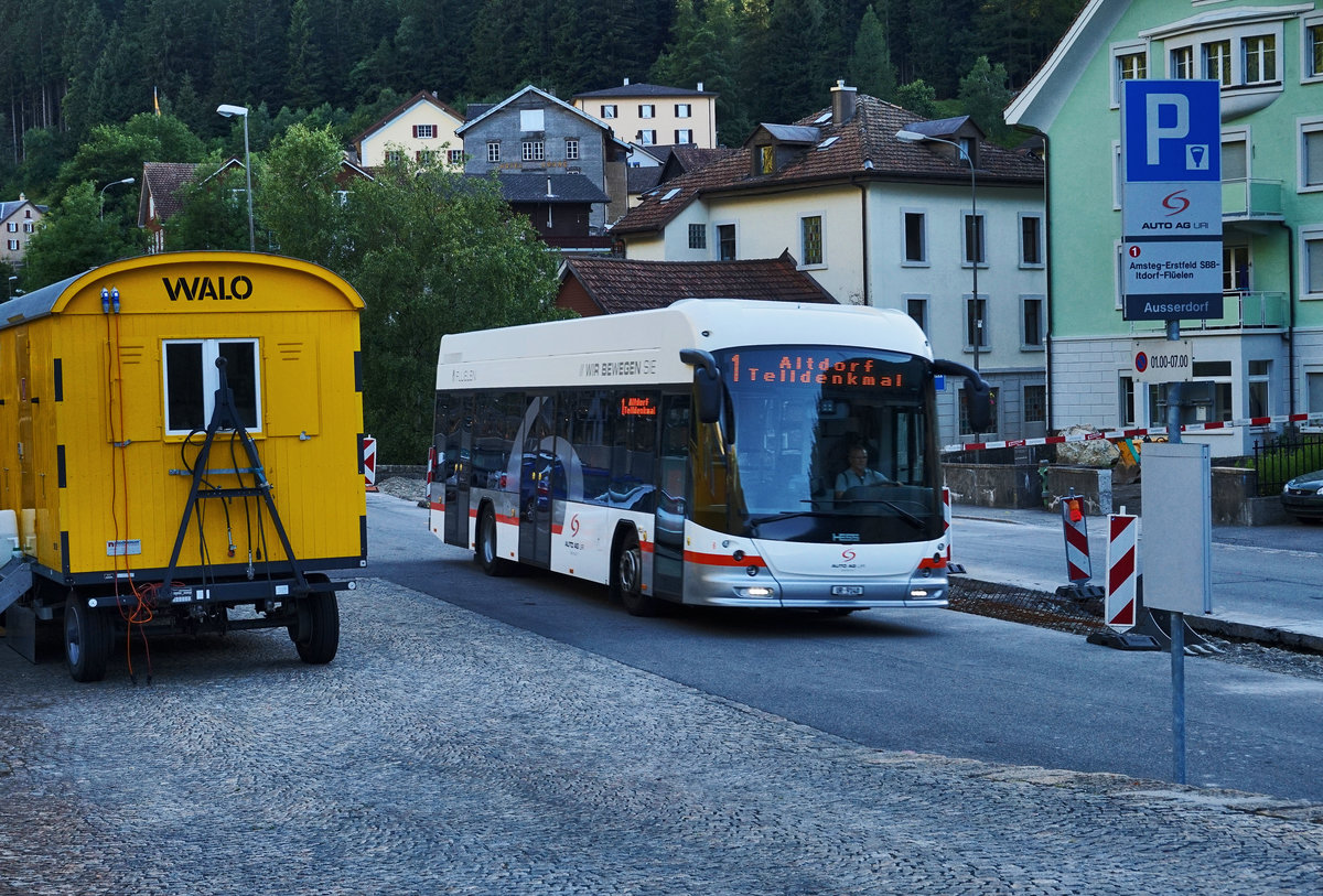 Ein Hess SwissDiesel der AAGU, unterwegs auf der Linie 60.401 (AAGU-Linie 1) als Kurs 119 (Göschenen, Bahnhof - Altdorf UR, Telldenkmal).
Aufgenommen am 19.7.2016, nahe der Haltestelle Göschenen, Bahnhof.
