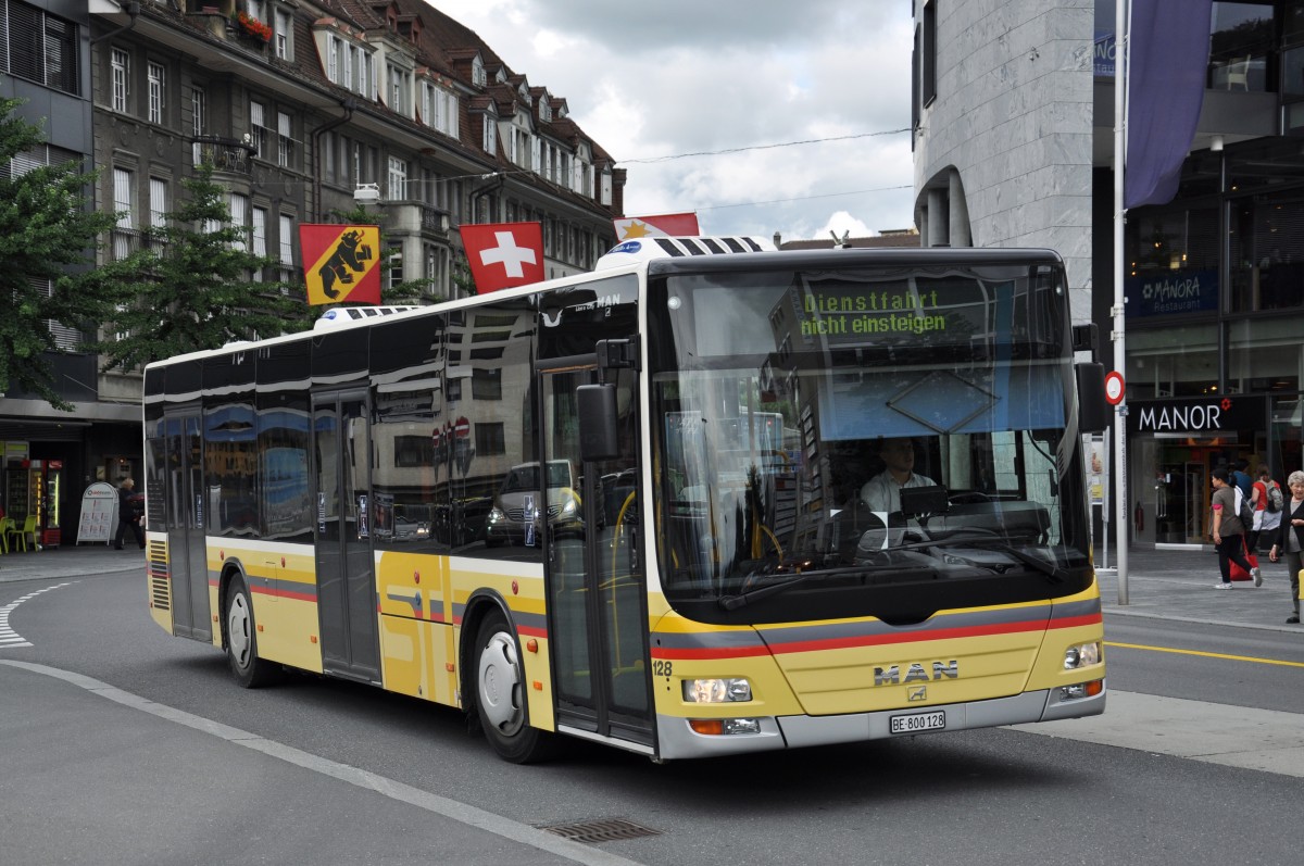 MAN Lions City 128 auf einer Dienstfahrt am Bahnhof Thun. Die Aufnahme stammt vom 29.07.2014.