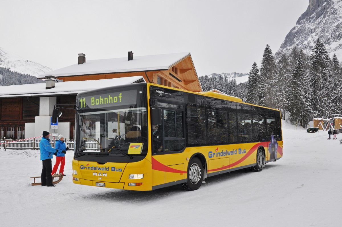MAN Lions City von Grindelwald Bus auf der Linie 11 beim Hotel Wetterhorn oberhalb von Grindelwald. Die Aufnahme stammt vom 29.12.2014.