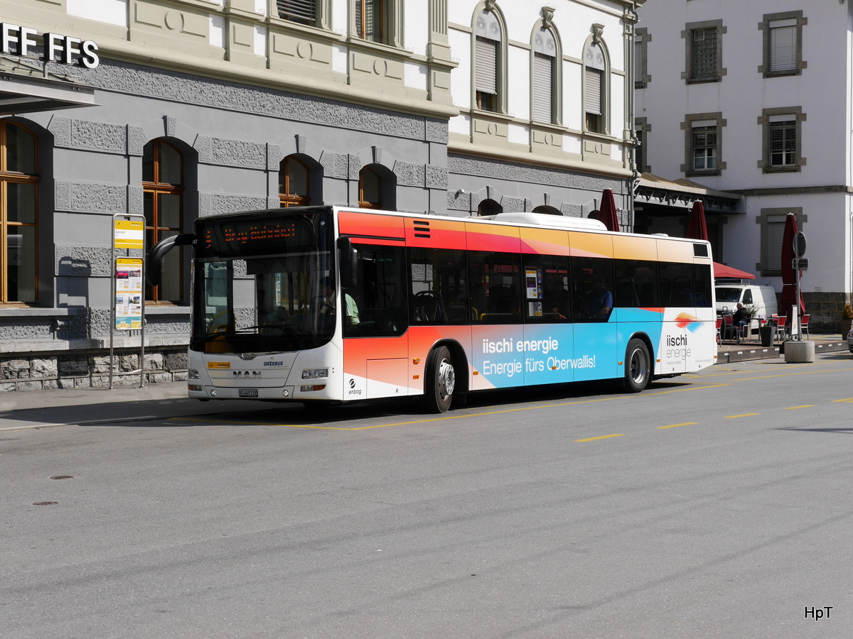 Postauto / Ortsbus Brig - MAN Lion`s City VS 449119 vor dem Bahnhof in Brig am 01.04.2017