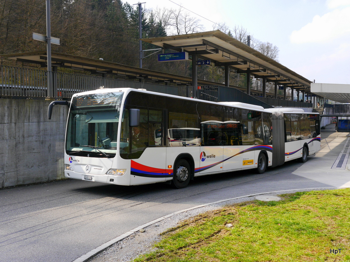Postauto - Mercedes Citaro AG 407400 bei der Wegfahrt von den Haltestellen Melligen-Heitersberg am 11.03.2016