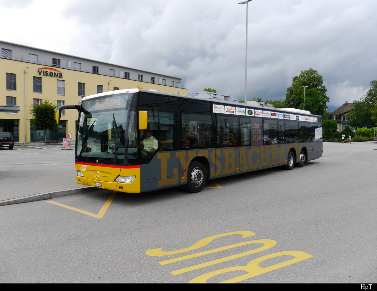 Postauto - Mercedes Citaro  BE 639516 mit Werbung unterwegs auf der Linie 74 in Lyss am 21.07.2018
