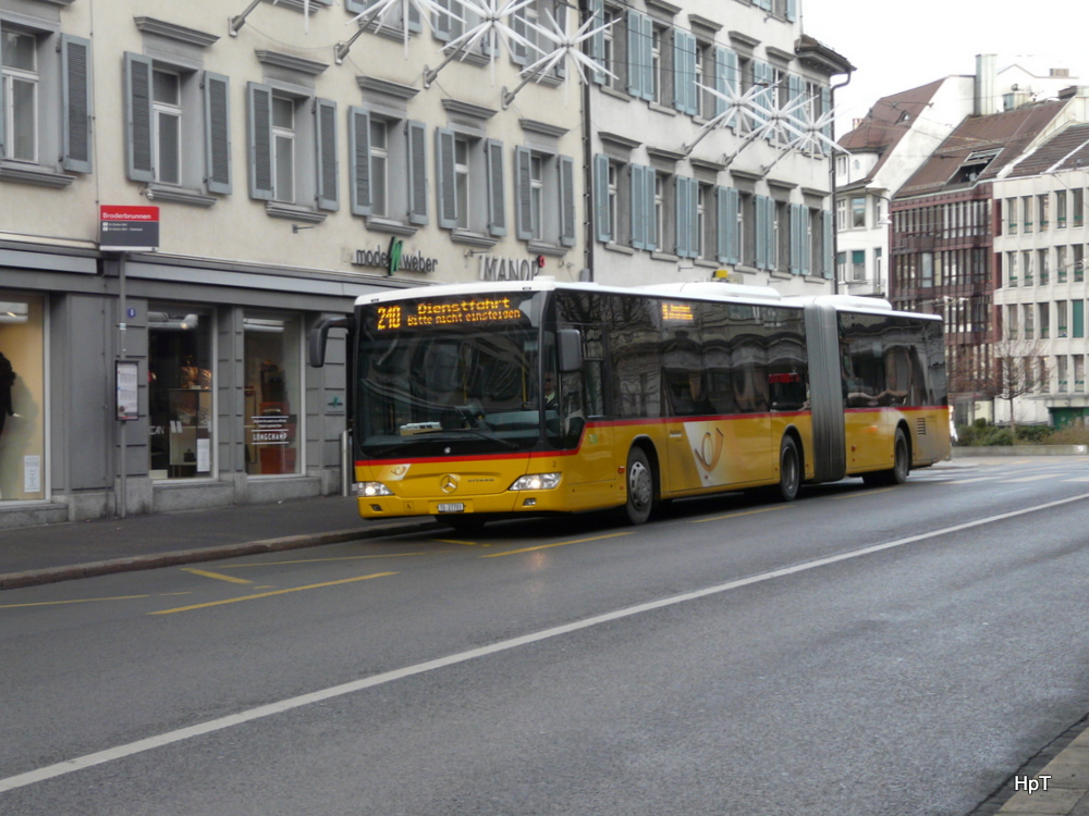 Postauto - Mercedes Citaro  TG  27701 unterwegs auf der Linie 210 in der Stadt St.Gallen am 22.12.2013