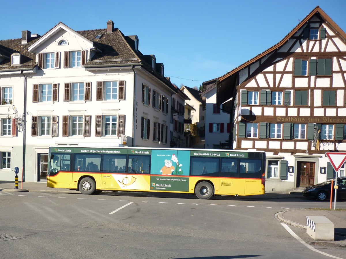 PostAuto Region Ostschweiz, Kursgruppe Uznach: Setra S 416 NF (2008) SG 304'012, am 31. Dezember 2013 an der Hauptstrasse beim Bahnhof in 8716 Schmerikon (SG) 