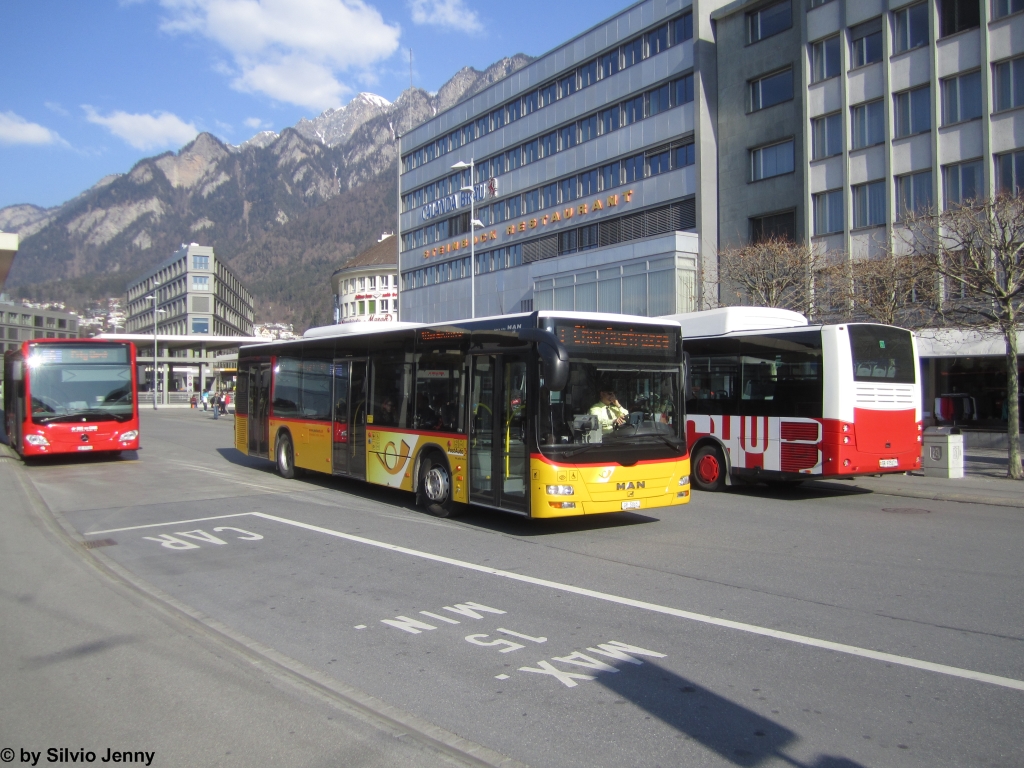 Postauto/PU Dünser GR 5865 (MAN A21 Lion's City) am 23.3.2015 beim Bhf. Chur