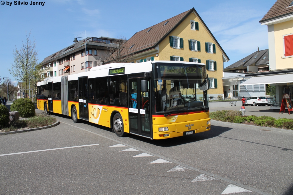 Postauto/Regie Zürcher Unterland Nr. 143 (MAN A23) am 14.4.2015 in Bülach, Sonnenhof