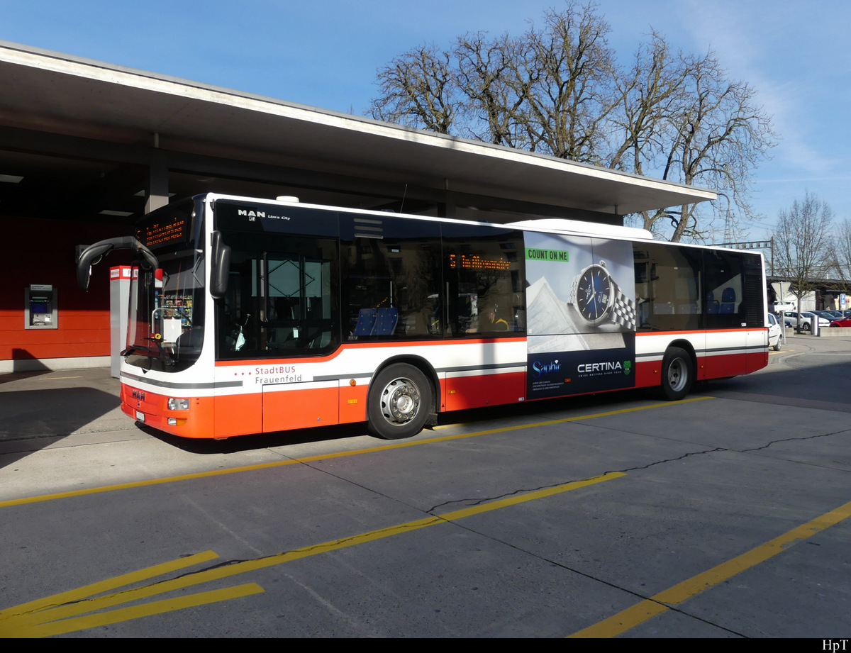 StadtBus Frauenfeld / Postauto - MAN Lion`s City TG 158098 vor dem Bahnhof in Frauenfeld am 05.02.2021