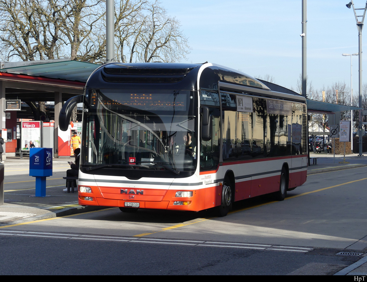 StadtBus Frauenfeld / Postauto - MAN Lion`s City Hybrid  TG 158100 bei den Bushaltestellen beim Bahnhof in Frauenfeld am 05.02.2021