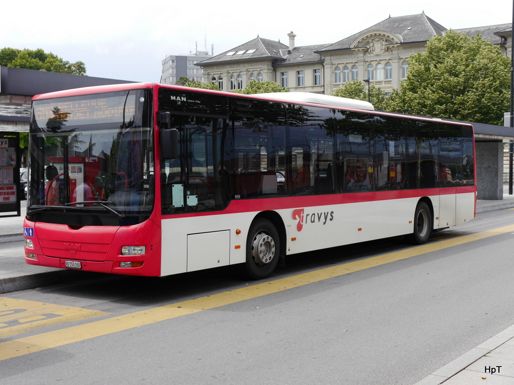 Travys - MAN Lion`s City  VD 550260 bei den Bushaltestellen beim Bahnhof von Yverdon les Bains am 20.07.2014