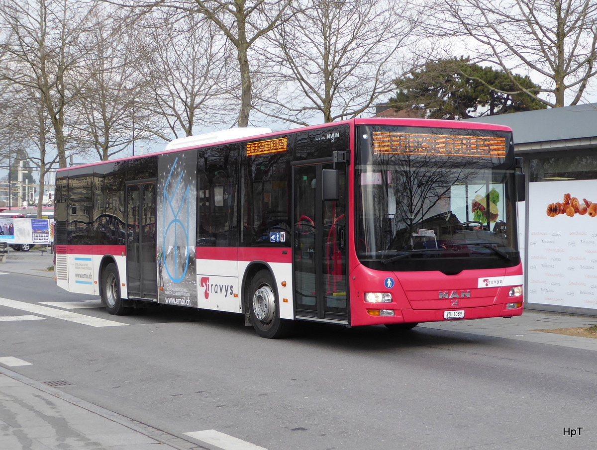 travys - MAN Lion`s City  VD  1089 unterwegs vor dem Bahnhof in Yverdon les Bains am 18.02.2016