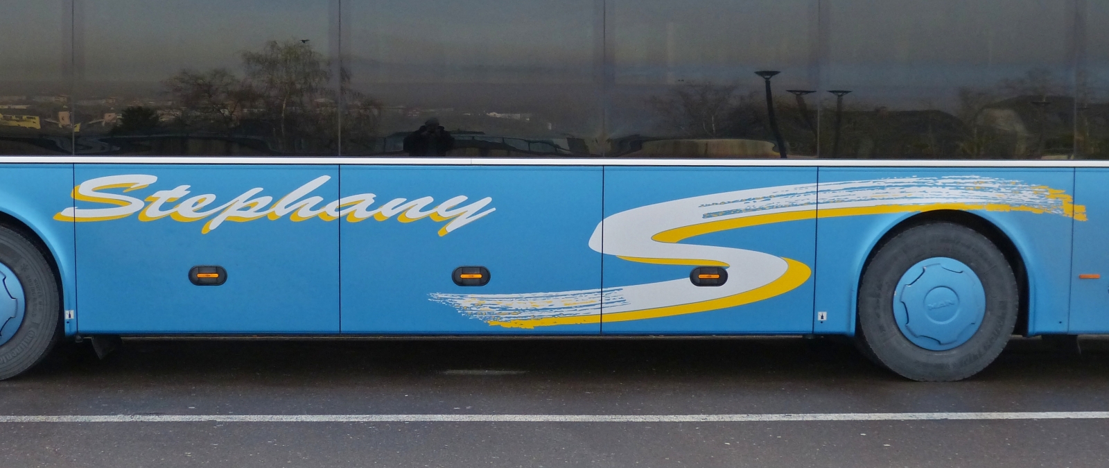Schriftzug auf der Seite am MAN Lion’s Regio von Autobus Stephany. 03.2023