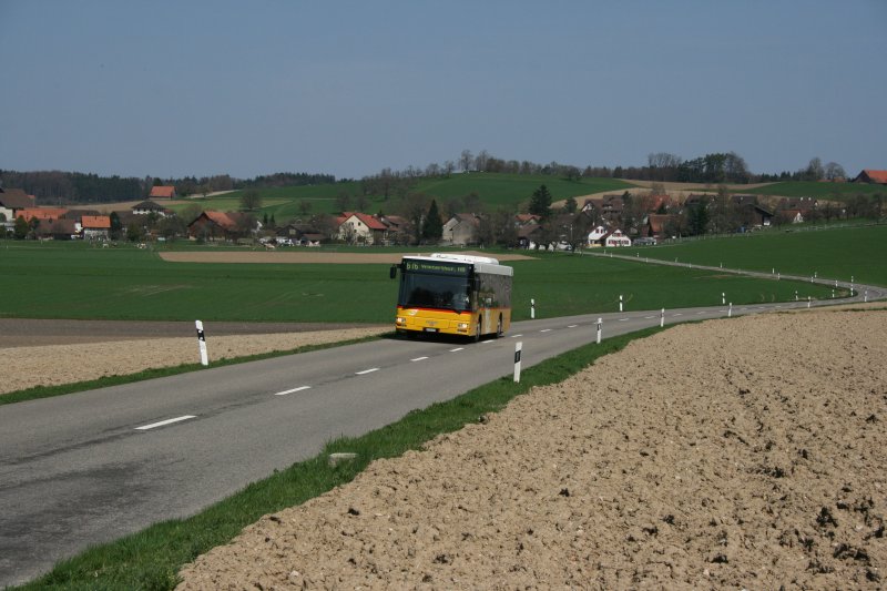 PostAuto Zrich, PU Motrag, Flaach, Nr. 159 (ZH 594'873, MAN NL313/A21, 2003) am 10.4.2009 zwischen Rutschwil und Hettlingen (Linie 676). 