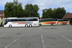 3 Reisebusse von Hofmann Reisen am 25.09.2015 in Landau/Pfalz. Links ein MAN Lion's Coach, dahinter 2 Mercedes Benz Travego 