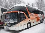 Ein Hartmann-Bus, im verschneiten Bayr. Wald, in Rimbach, auf dem Hotel-Parkplatz