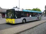Wagen 114, ein MAN A21, der Stadtbus Goslar am ZOB in Goslar. Hier mit Werbung fr die Goslarer Wohnstttengesellschaft.