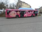 Das Foto zeigt einen MAN Lions City Bus mit Werbung fr ein Saarbrcker Cafe.