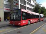 MAN Bus mit der Betriebsnummer 122 und der Vollwerbung fr das Bauhaus auf der Linie 21 am Bahnhof in Thun.