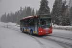 Engadin Bus, St.Moritz. Neoplan N4407 (GR 100'120) zwischen Chapella, La Resgia und Cinuos-chel - Brail, Staziun. (19.2.2010)