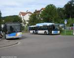 Das Foto zeigt einen Solaris Urbino sowie ein Bus der Marke MAN. Das Foto wurde am 06.09.2010 in Saarbrcken Brebach gemacht.