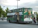 Doppeldecker-Bus der BVG mit Reklame Mbel-Hbner, hier an der Hst.