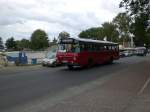 Ein Historischer Eindecker auf der heutigen Linie 133 in Alt-Heiligensee.Ein ehemaliger Bus der VHH in Hamburg.