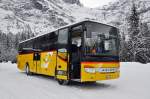 Setra Bus der Post auf dem Parkplatz vor dem Hotel Wetterhorn oberhalb von Grindelwald. Die Aufnahme stammt vom 29.12.2014.