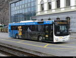 Postauto / Ortsbus Brig/Glis - MAN Lion`s City  VS  449117 vor dem SBB Bhf. Brig am 26.02.2023