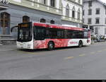 Postauto / Ortsbus Brig/Glis - MAN Lion`s City  VS  449118 vor dem SBB Bhf. Brig am 26.02.2023