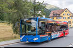 Engadin Bus Bahnersatzbus mit BÜGA-Werbung am 15. Juli 2017 beim Bahnhof Samedan.