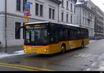 Postauto - MAN Lion`s City ZH 332706 unterwegs bei leichtem Schneefall in Winterthur am 2023.01.22