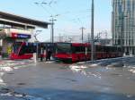Bern Mobil - NAW Trolleybus Nr.7 und Trolleybus Nr.1 sowie Tram Be 6/8 657 bei der Haltestelle Bern Wankdorf am 30.11.2013