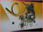 Postauto Gotthard Postkutsche als Detail auf dem Neoplan Starliner. (Sommer 2005)