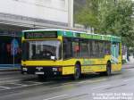 herten-vestische-strasenbahnen-gmbh MAN Bus der Vestischen auf der Linie 234 in der Stadtmitte Herten vor dem ehemaligen Karstadt Kaufhaus bei einer kleinen Pause vor der Fahrt nach Gelsenkirchen-Hassel. Ein Foto vom Fr�hjahr 2006, ca. Ende April. 'Bunte' Busse sind bei der Vestischen nicht ungew�hnlich. Einige Fahrzeuge fahren in der klassichen rotwei�en Lackierung ohne Werbung, andere werden voll als Werbetr�ger genutzt, aber gelb und gr�n lackiert ist doch schon etwas selten.