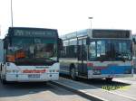 pforzheim 2 Generationen bei der Firma Eberhardt. Links ein Neoplan Centroliner N4416, rechts ein O405GN�. Aufgenommen in Pforzheim HBF.